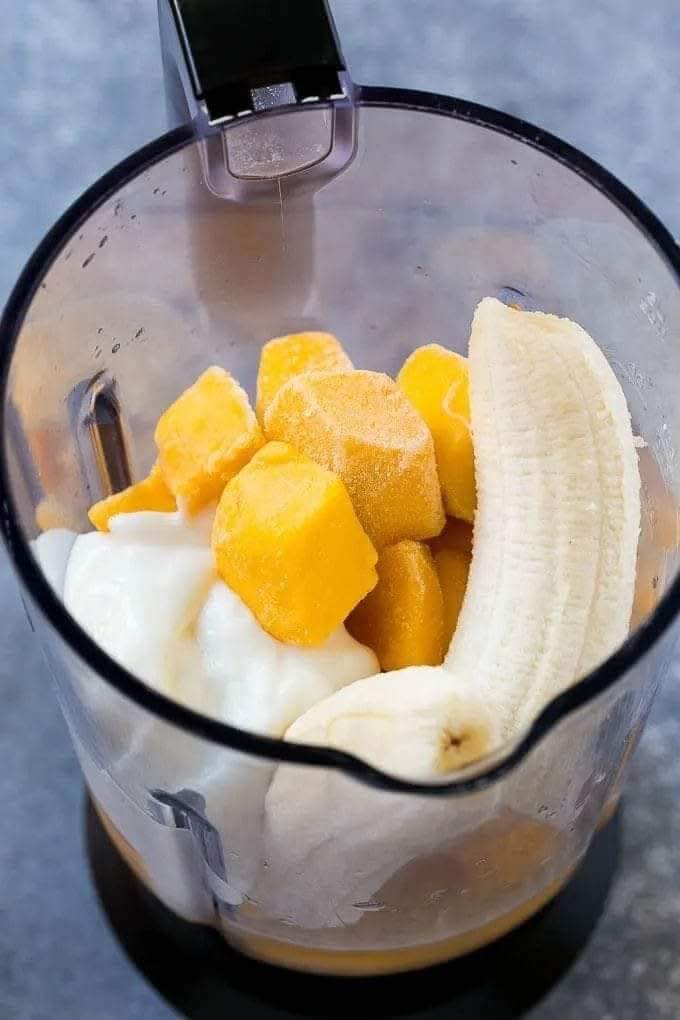 sliced-mango-banana-and-yogurt-ready-to-blend-in-the-blender.