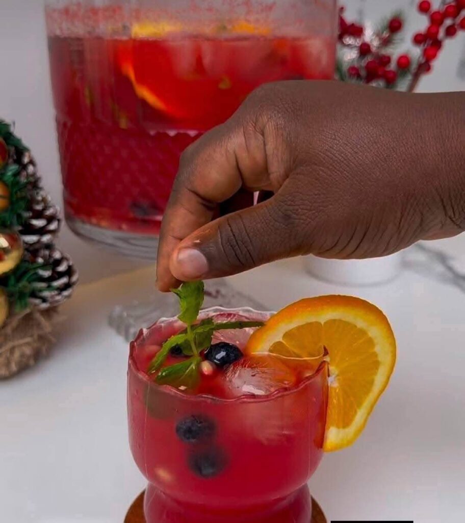 adding-a-mint-leave-to-the-watermelon-punch-cup